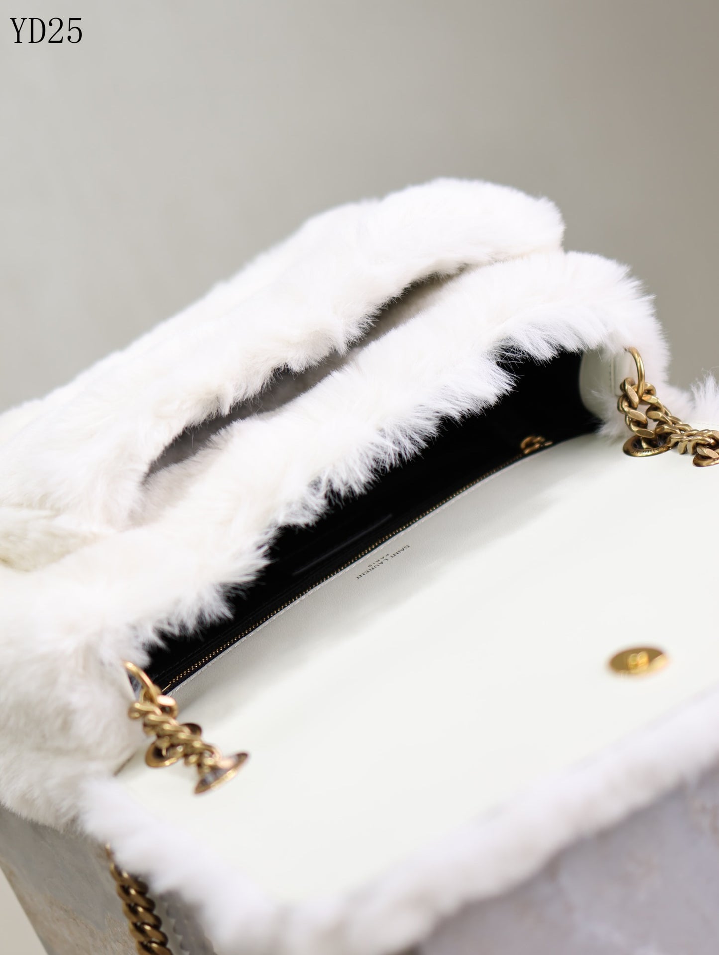 Niki Small in Shearling Bag