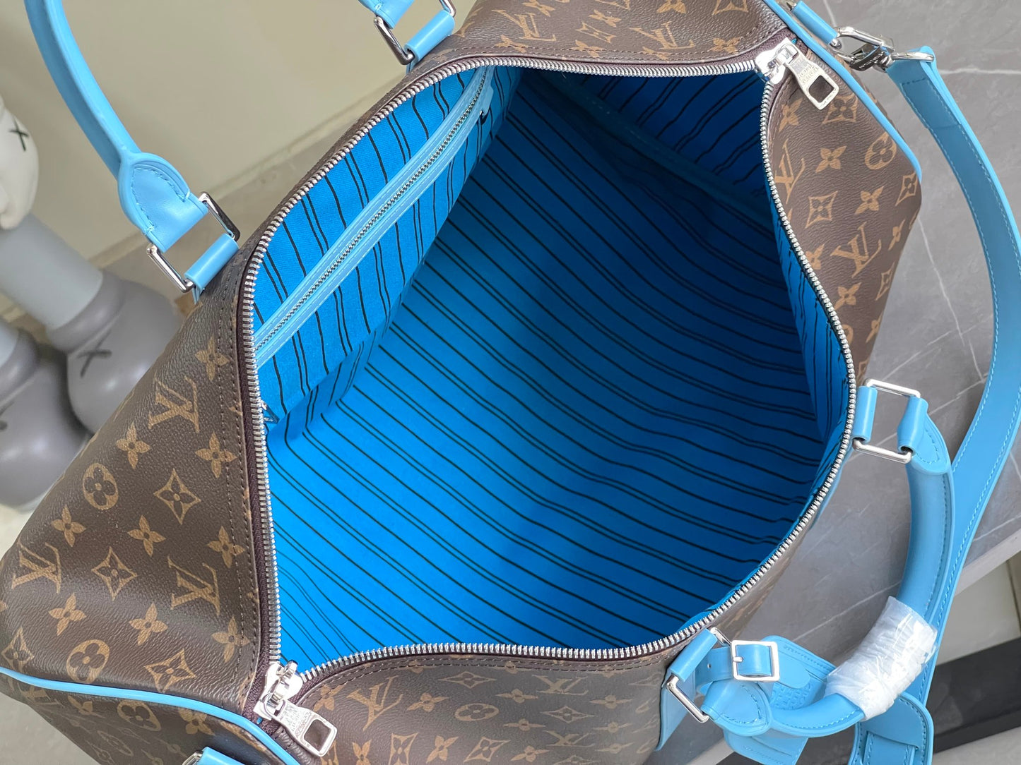 Keepall Bandoulière 50 – Monogram Canvas with Sky Blue Leather Trim