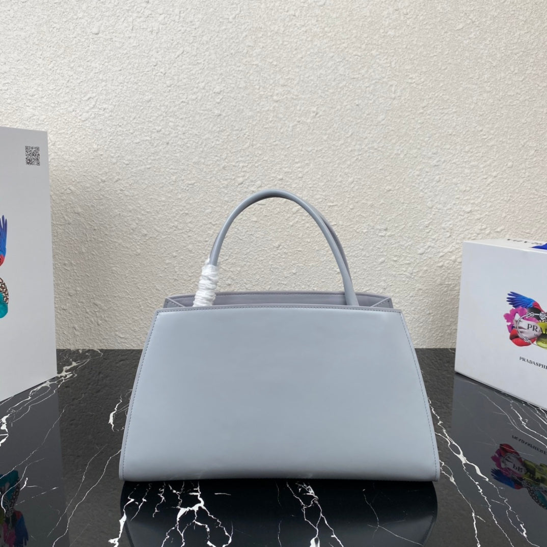 Supernova Triangle Top Handle Bag