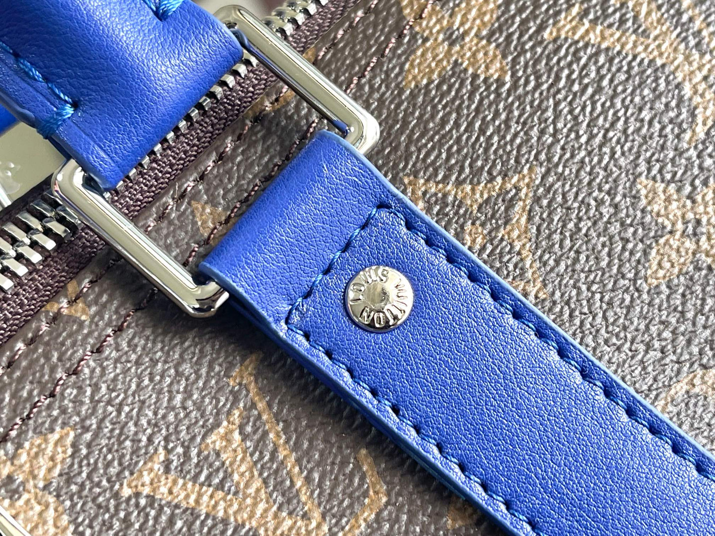 Keepall Bandoulière 50 – Monogram Canvas with Blue Leather Trim