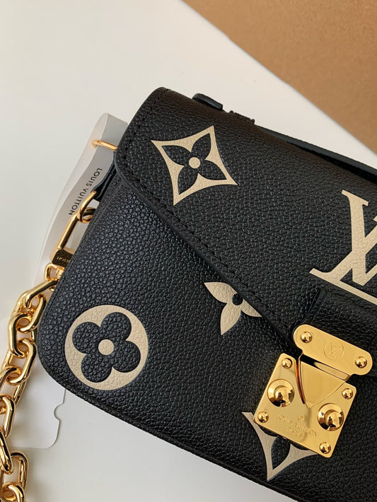 Pochette Métis East West Monogram Leather Bag