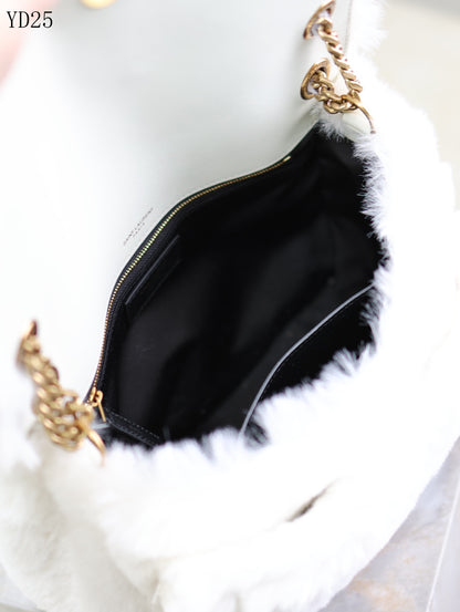Niki Small in Shearling Bag